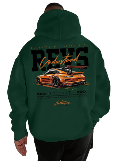 Person wearing a green hoodie with a car graphic and text on the back.